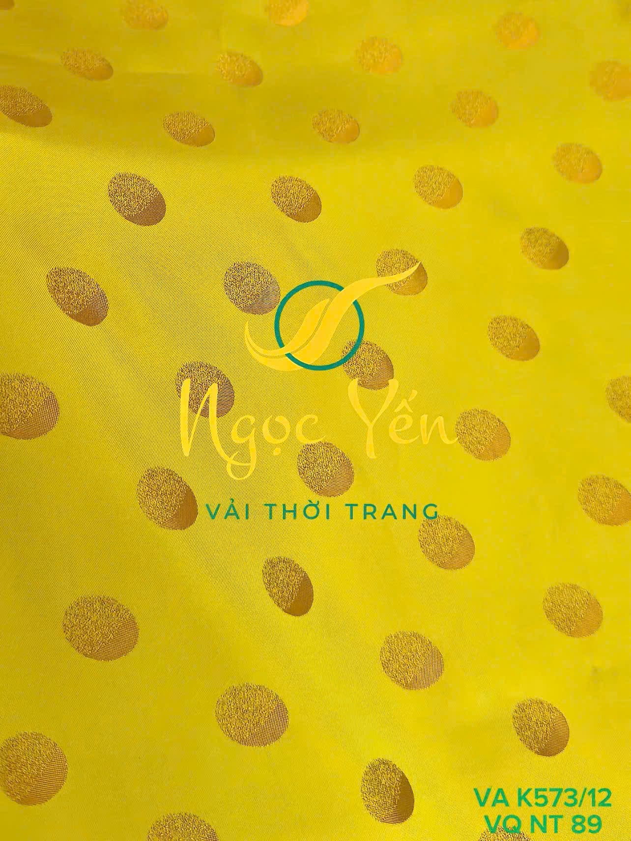 VA K573/12-Vải áo dài lụa họa tiết chấm bi vàng